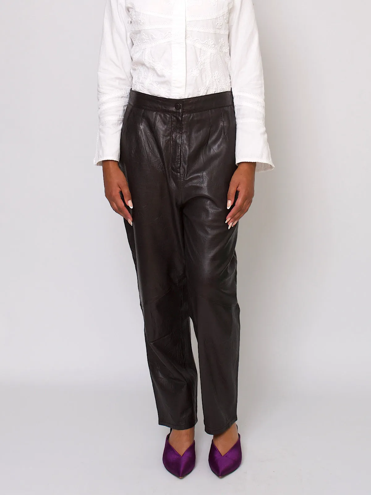 80s vintage high waisted pleated leather trousers in black