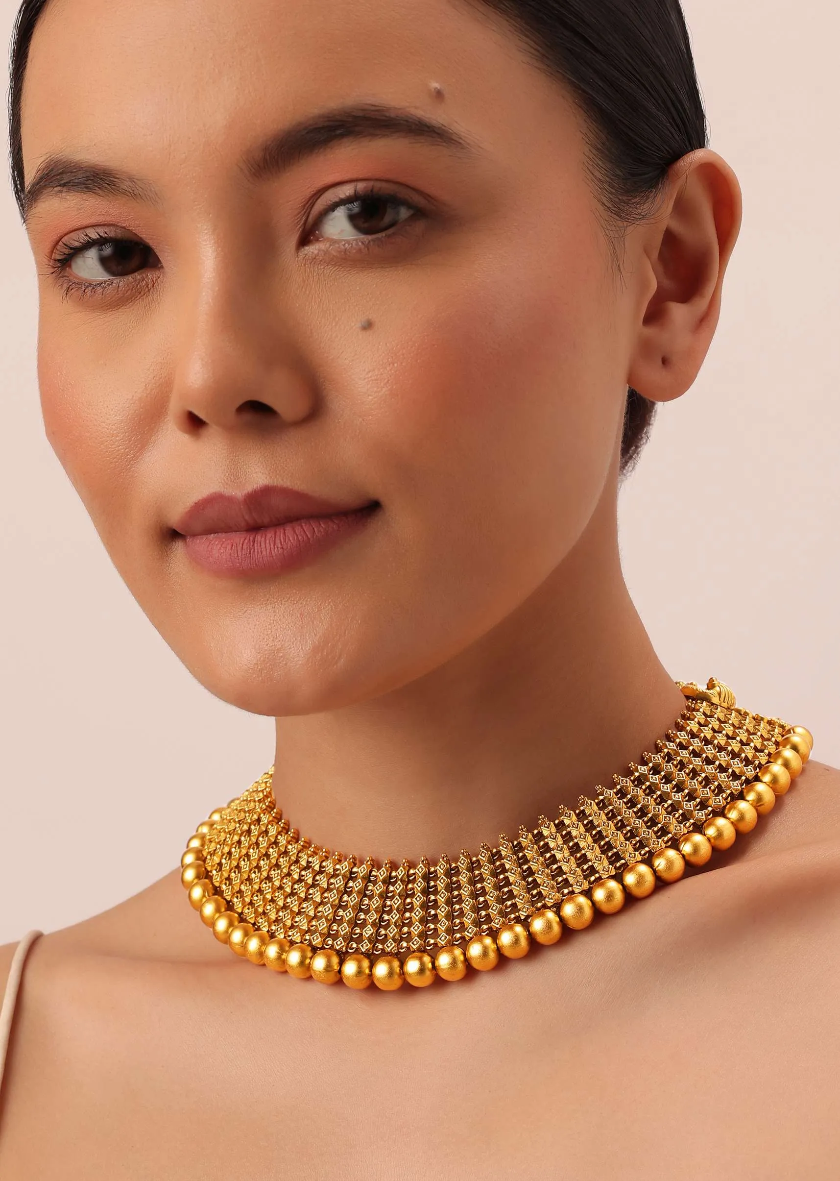 Gold Tone Temple Necklace With Layered Earrings